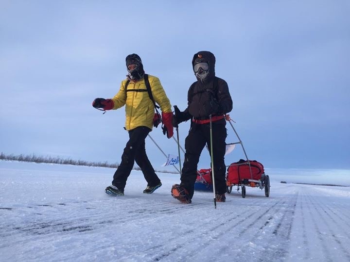 Two ultramarathon participants in the middle of their Arctic race